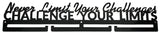 A black galvanised steel quote wall decor that reads 'Never Limit Your Challenges CHALLENGE YOUR LIMITS' on a plain background.