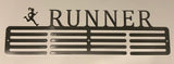 A stainless steel medal hanger with the word 'RUNNER' above two rows of slots, designed to mount on a wall.