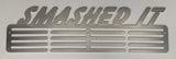 A brushed stainless steel award plaque with the inscription 'SMASHED IT' on it, displayed against a plain background.